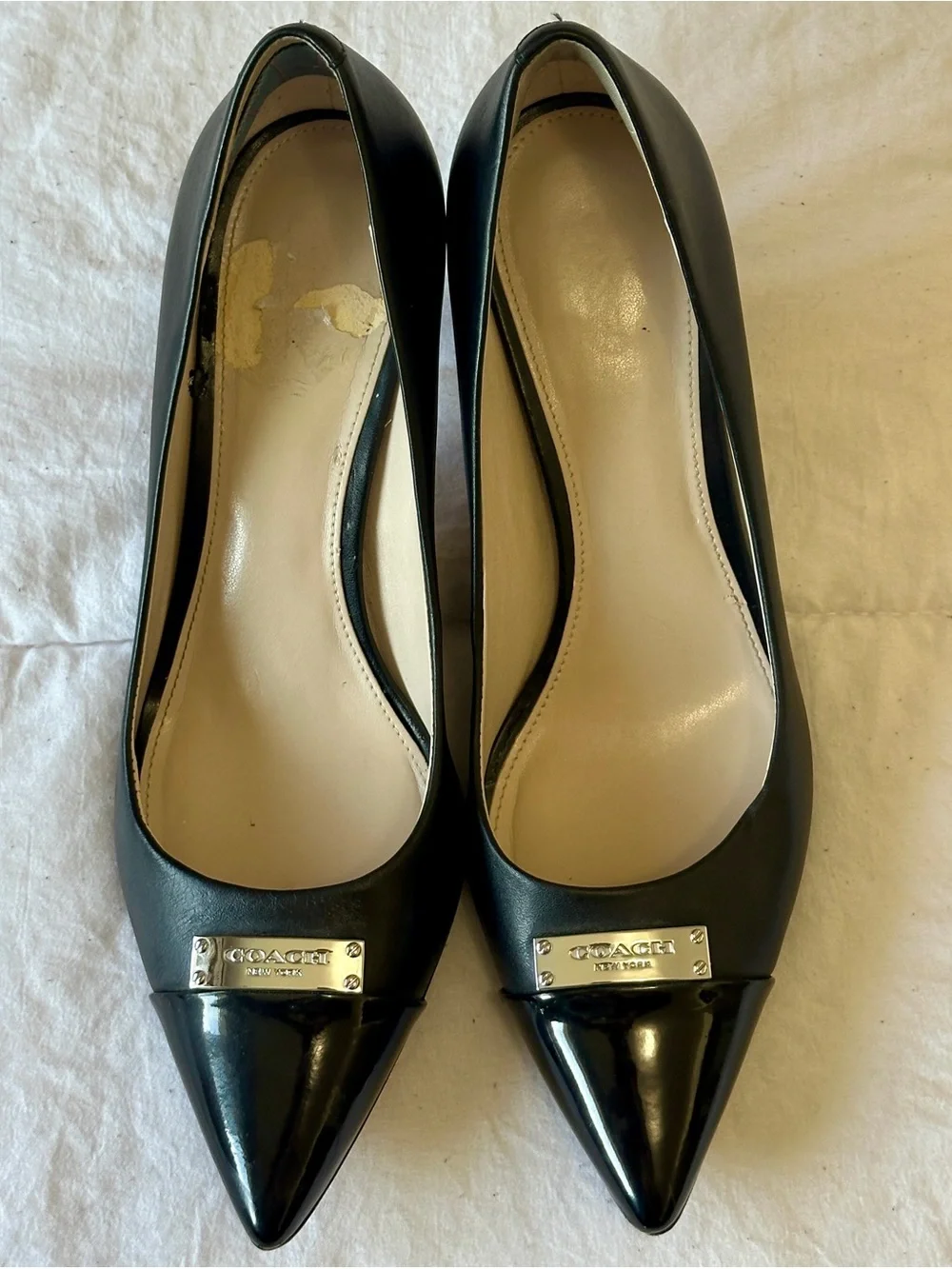 Coach Black Pointed-Toe Leather Flats with Logo Cap